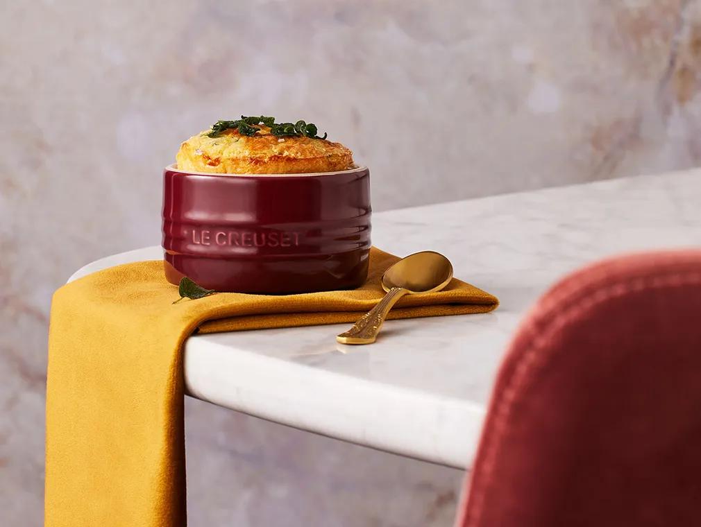 Parmesan-Pfitzauf mit Kräutern